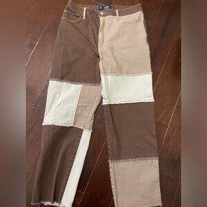 Brown, tan, and cream patch jeans. High rise Dad Jeans.